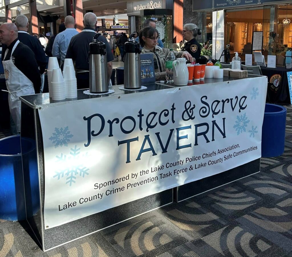 Protect and serve booth at the greats lakes mall